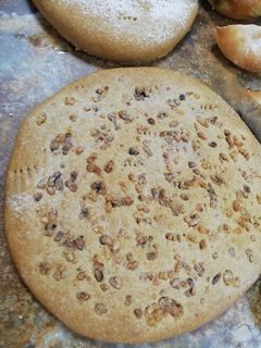 Una foto de Tortilla de rescoldo con Chicharrones