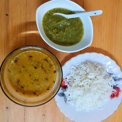A picture of 3 colour meal daal chawal.