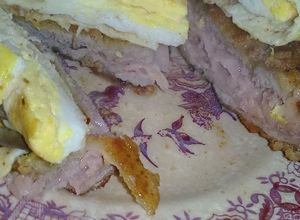 Una foto de Milanesa rellena con poncho