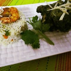 A picture of Prawn fried rice with coriander chicken.