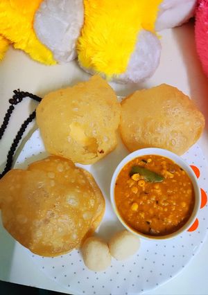 প্লেন পুরি বা লুচি ছোলার ডাল (luchi o chana dal recipe in bengali) রেসিপির প্রধান ছবি
