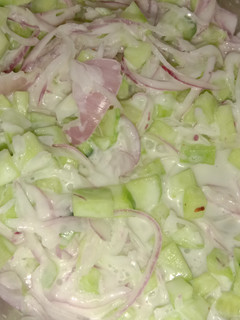 A picture of Cucumber onion cream salad.