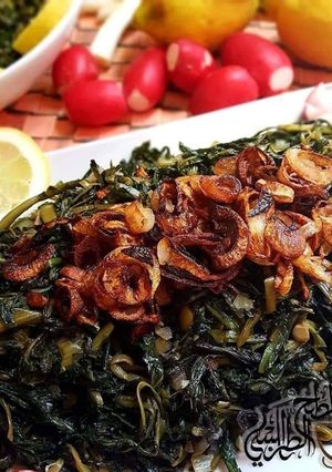 A picture of Dandelion_greens_with_oil.