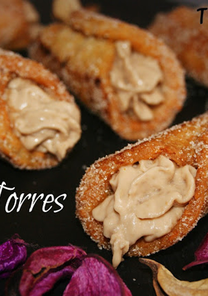 Una foto de Canelones dulces "Intxaursaltsa" toque Torres