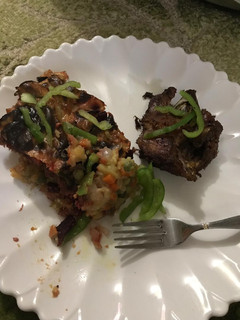 A picture of Mashed potatoes with Veggies and mince meat.