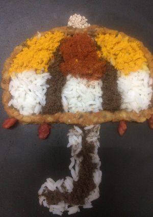 A picture of Rainy season SpecialUmbrella Dal Rice Emoji.