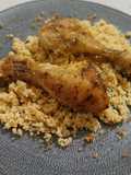 Muslitos de pollo especiados al horno con cuscús en su jugo