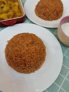 صورة لوصفة طريقة عمل التمن الأحمر العراقي 😋 (رز أحمر)