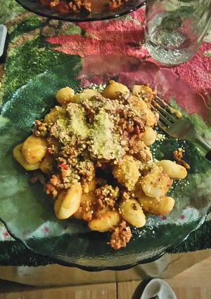 Una foto de Ñoquis con salsa boloñesa