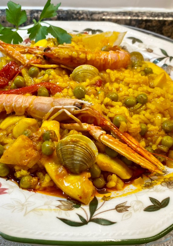 Una foto de “ Arroz meloso” con anillas de pota
