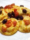 Ravioloni all'ombrina con pomodoro e olive taggiasche