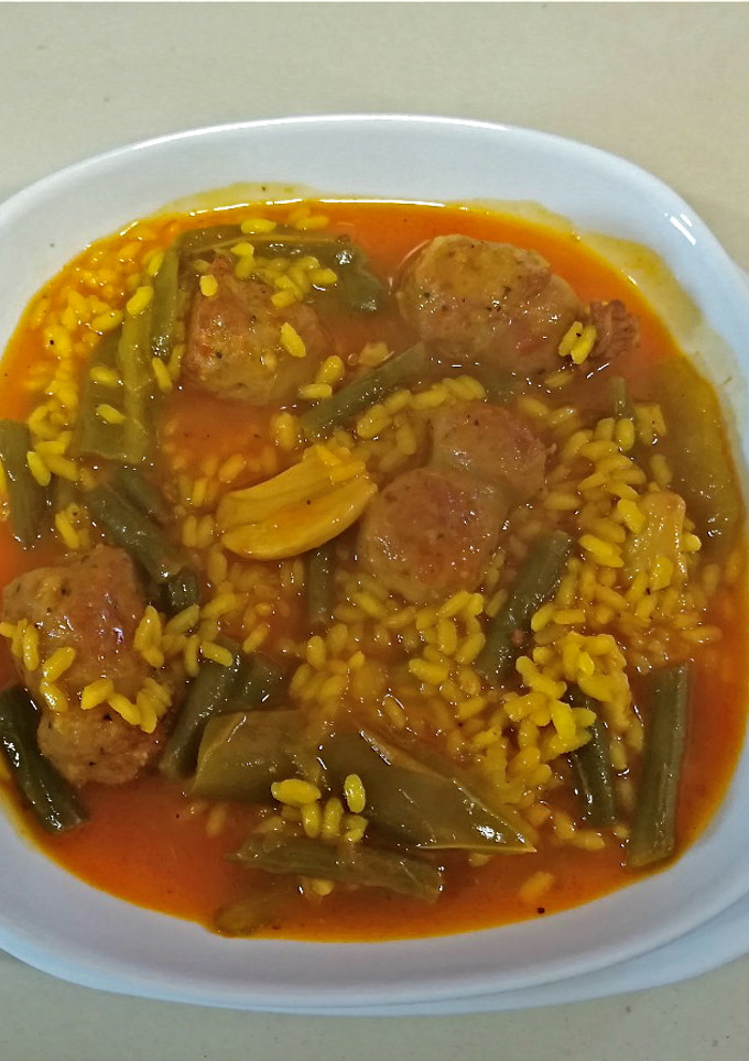 Una foto de Arroz con butifarra