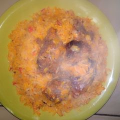 A picture of Palm oil concotion jollop Rice.