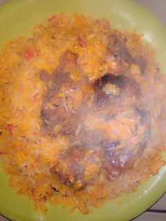 A picture of Palm oil concotion jollop Rice.