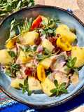 Salade de pommes de terre tièdes, harengs fumés et pourpiers