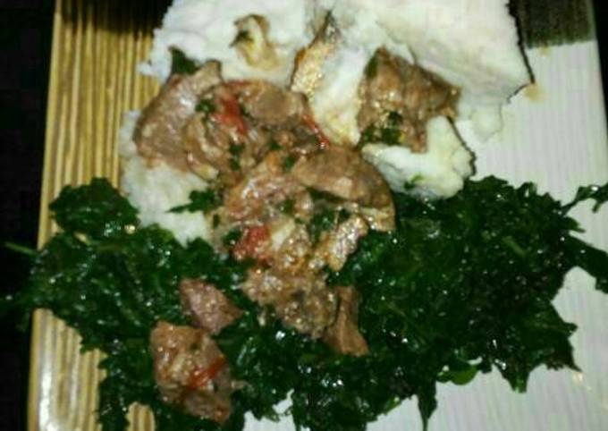 Ugali served with managu & beef