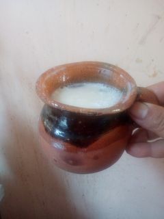 Una foto de Atole de maíz con guayaba