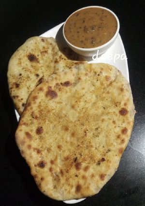 A picture of Heathy Onion stuffed kulcha whole wheat garlic butter.