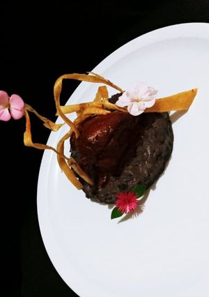 Una foto de Pollo enchilado