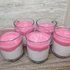 A picture of Creamy dessert with strawberry.