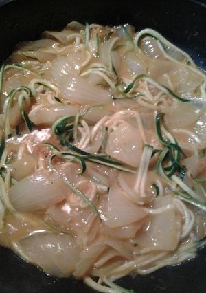 A picture of Buttery curried onions with zucchini "noodles".