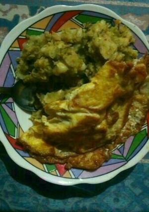 A picture of Mukimo with fried eggs.