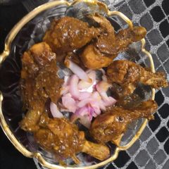 A picture of Masaledar chicken drumstick.