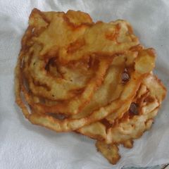 A picture of Homemade Funnel cakes.