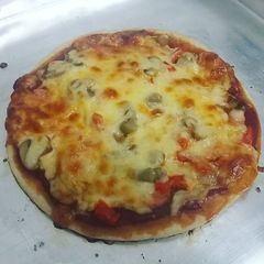 A picture of Cheesy pizza  paratha.