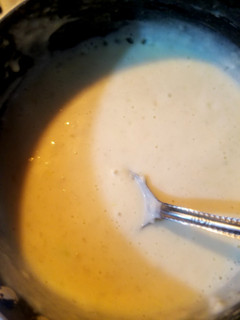Una foto de Salsa con ajo y queso