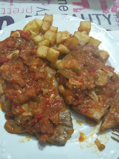 Una foto de Chuleta aguja en salsa