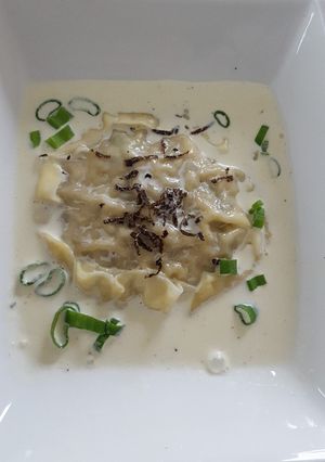 Une photo de Ravioli veau et crème truffée