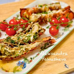 A picture of Lobster tails in aromatic butter.