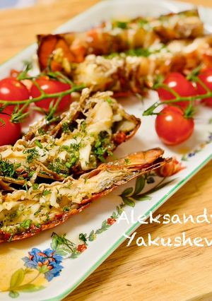 A picture of Lobster tails in aromatic butter.