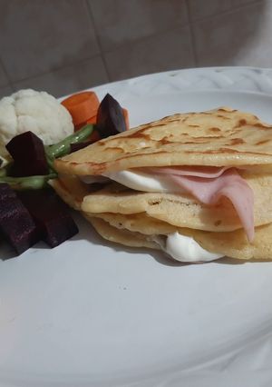 Una foto de Crepas de jamón con queso