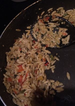 A picture of Orzo pasta with Brie.