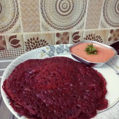 Beet root chila with spicy chutney A picture of Beet root chila with spicy chutney.