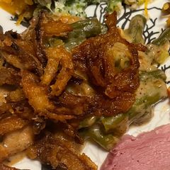 A picture of Green bean casserole with homemade fried onions.