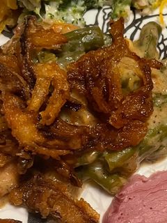 A picture of Green bean casserole with homemade fried onions.