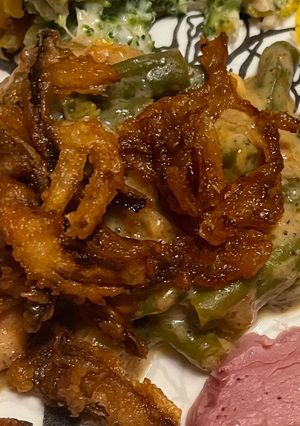 A picture of Green bean casserole with homemade fried onions.