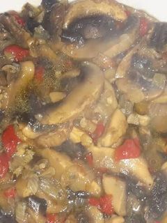 Una foto de Champiñones en salsa