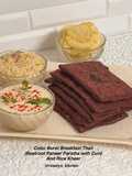 Color Burst Breakfast (Beetroot Paneer Paratha with Curd, Rice Kheer & Chips)