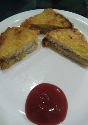 A picture of Schezwan jalapeno cheese bread pakora.