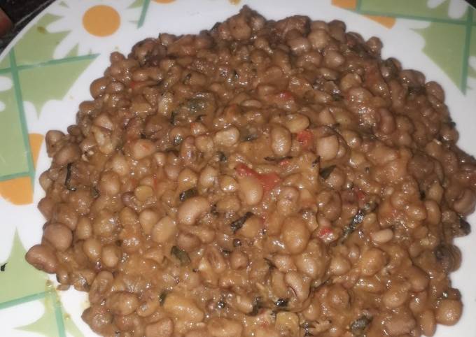 Jollof beans with scent leaf