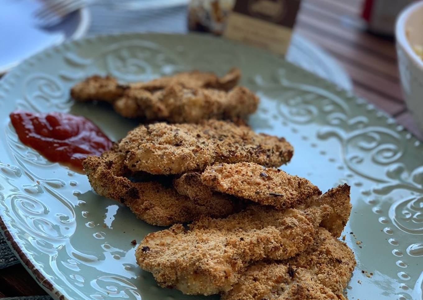 Pollo empanado jugoso al horno