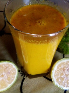 A picture of Turmeric Ginger and lemon juice.