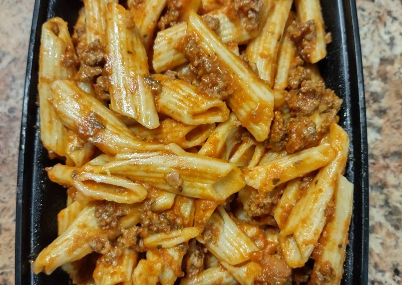 Wait chef with penne meat sauce