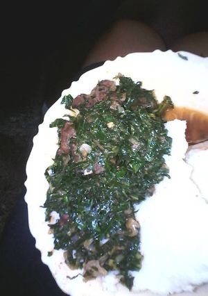 A picture of Ugali served wid kales n beef.