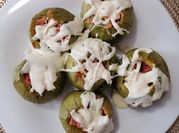Una foto de calabacitas con jamon