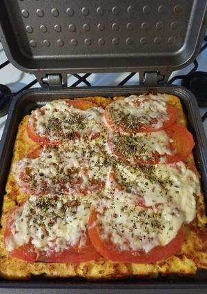 Una foto de Pizza con masa de polenta